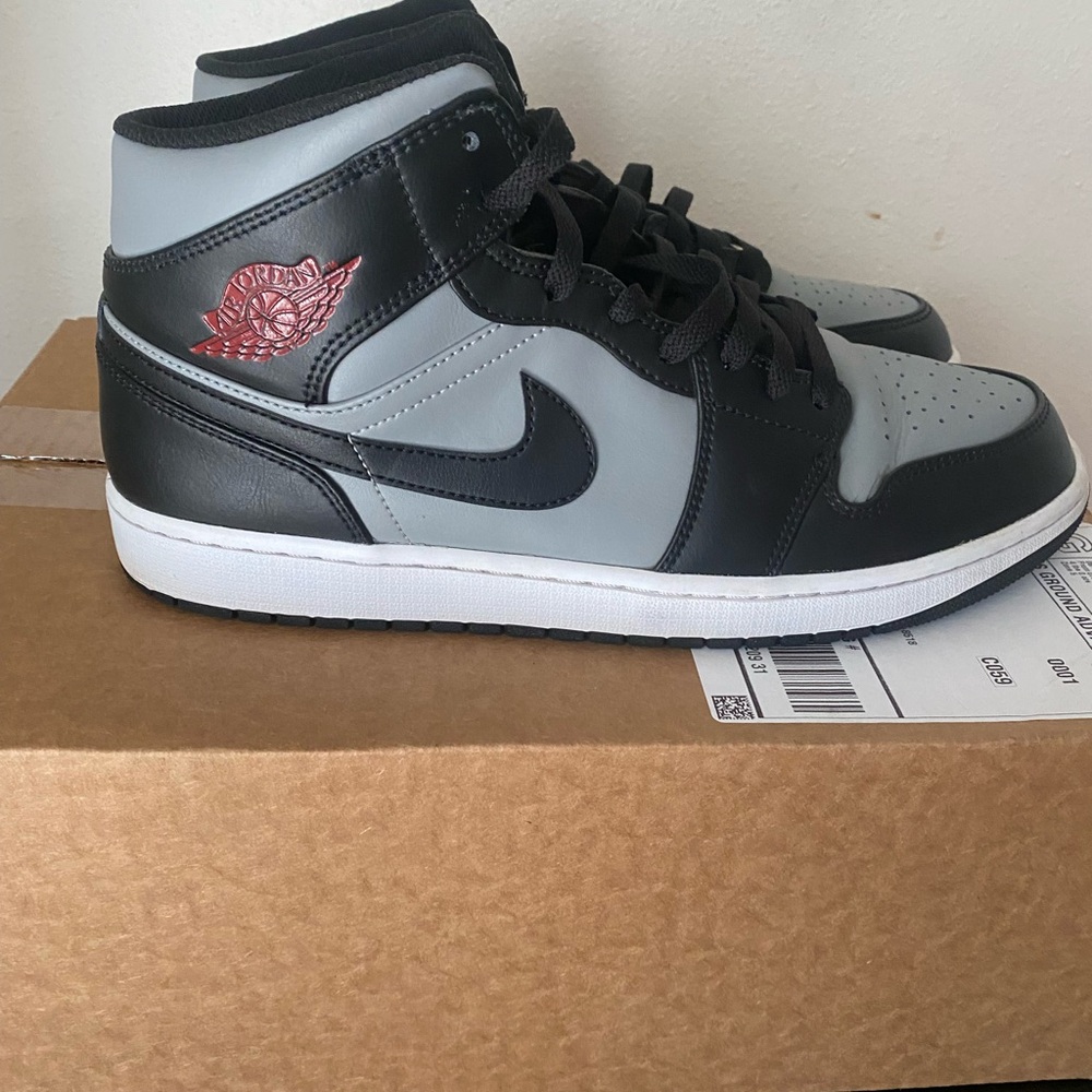 Jordan Black and Gray Sneakers with Red Detail